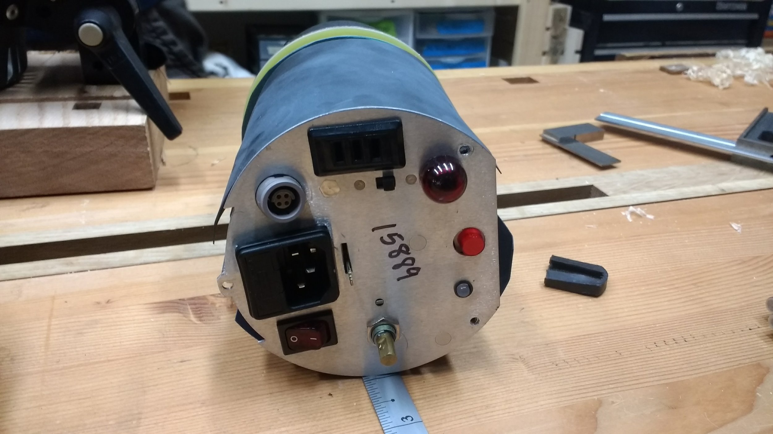 Back of the light head fixture, the metal plate was bent around the power plug, Jackrabbit plug, and the red button/dump button was totally unattached and just floating there.