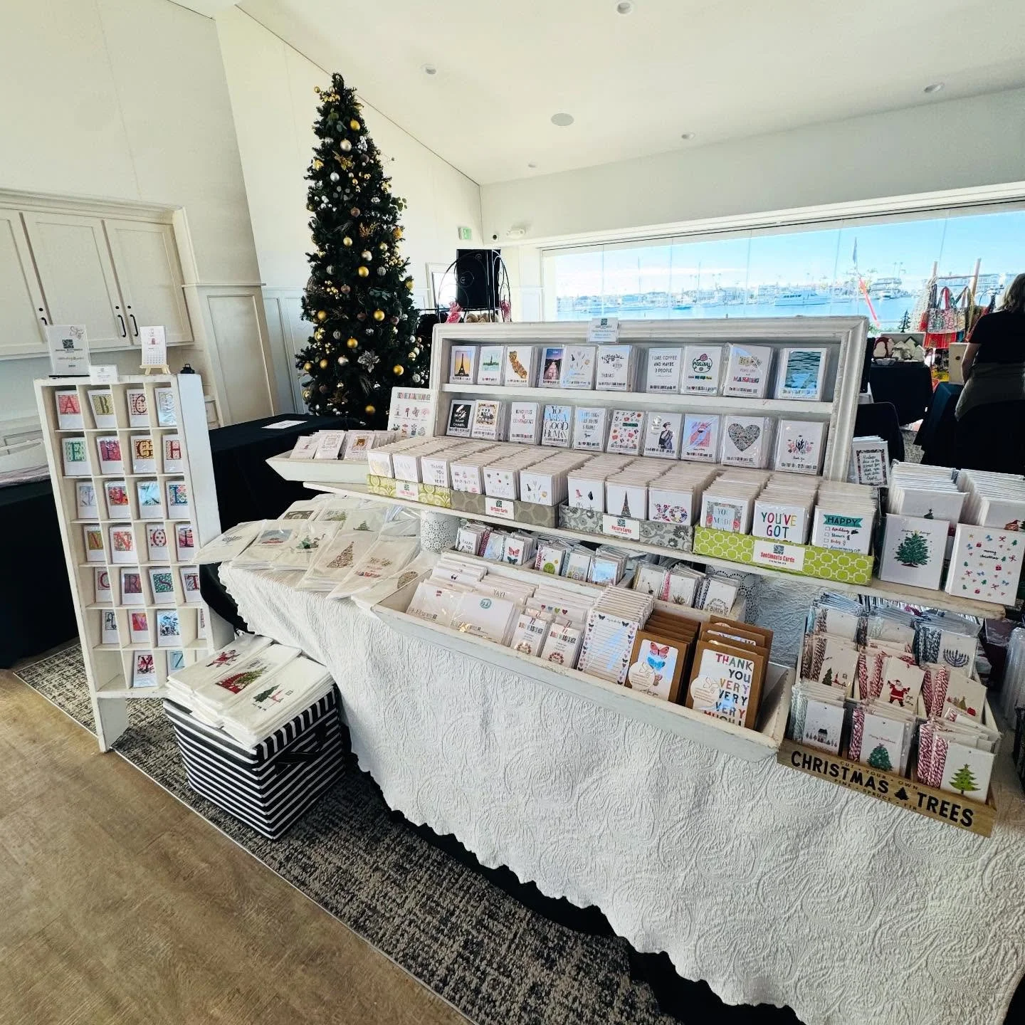 today we are at the Lido Isle Yacht Club&hellip;what a view in the background. lots of unique shopping today until 3:30 PM! 🎄🦋