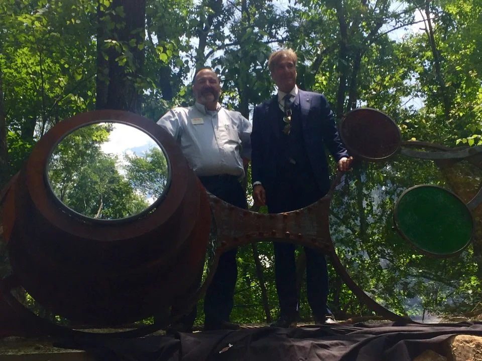 10 / 10 Carla Jean Whitley | cwhitley@al.com Schaeffer's Spectacles Red Mountain Park Executive Director David Dionne and Dr. Jack Schaeffer of Schaeffer Eye Center reveal "The Schaeffer Spectacles" at the park Friday afternoon. The Mesh Collective's Heather Spencer Holmes and Forrest Millsaps created the sculpture, along with glass work by Amy Soverow. (Carla Jean Whitley | cwhitley@al.com )