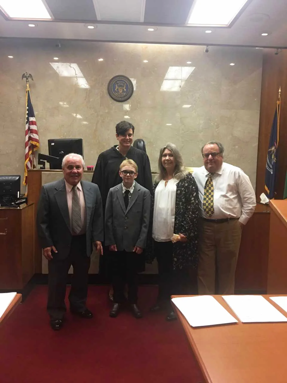 'He wiggled into our hearts': 12-year-old boy is adopted after nearly eight years in foster care
