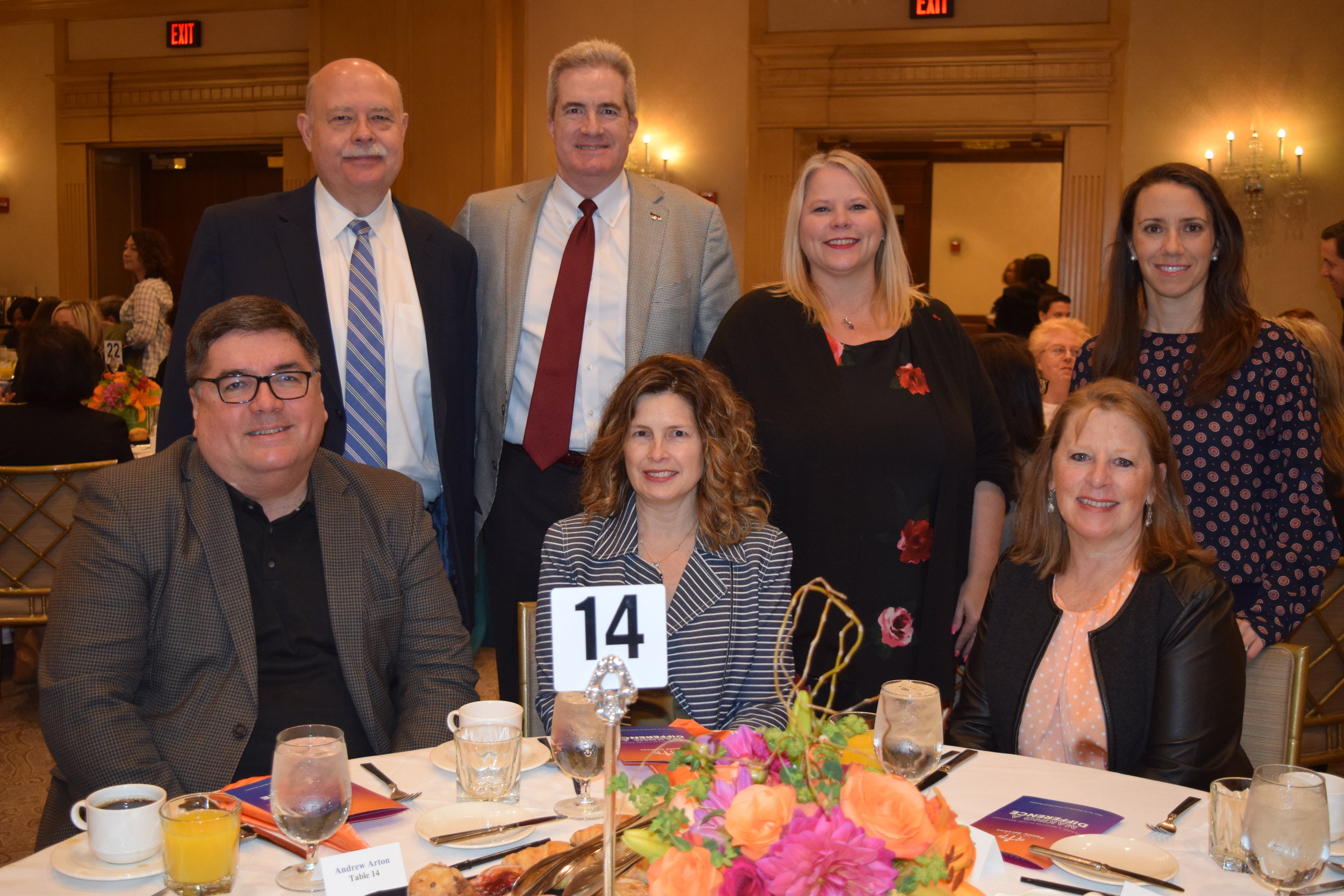 Representatives of breakfast sponsor KeyBank, including board member Ted Willett (top row second from left), attended the event.