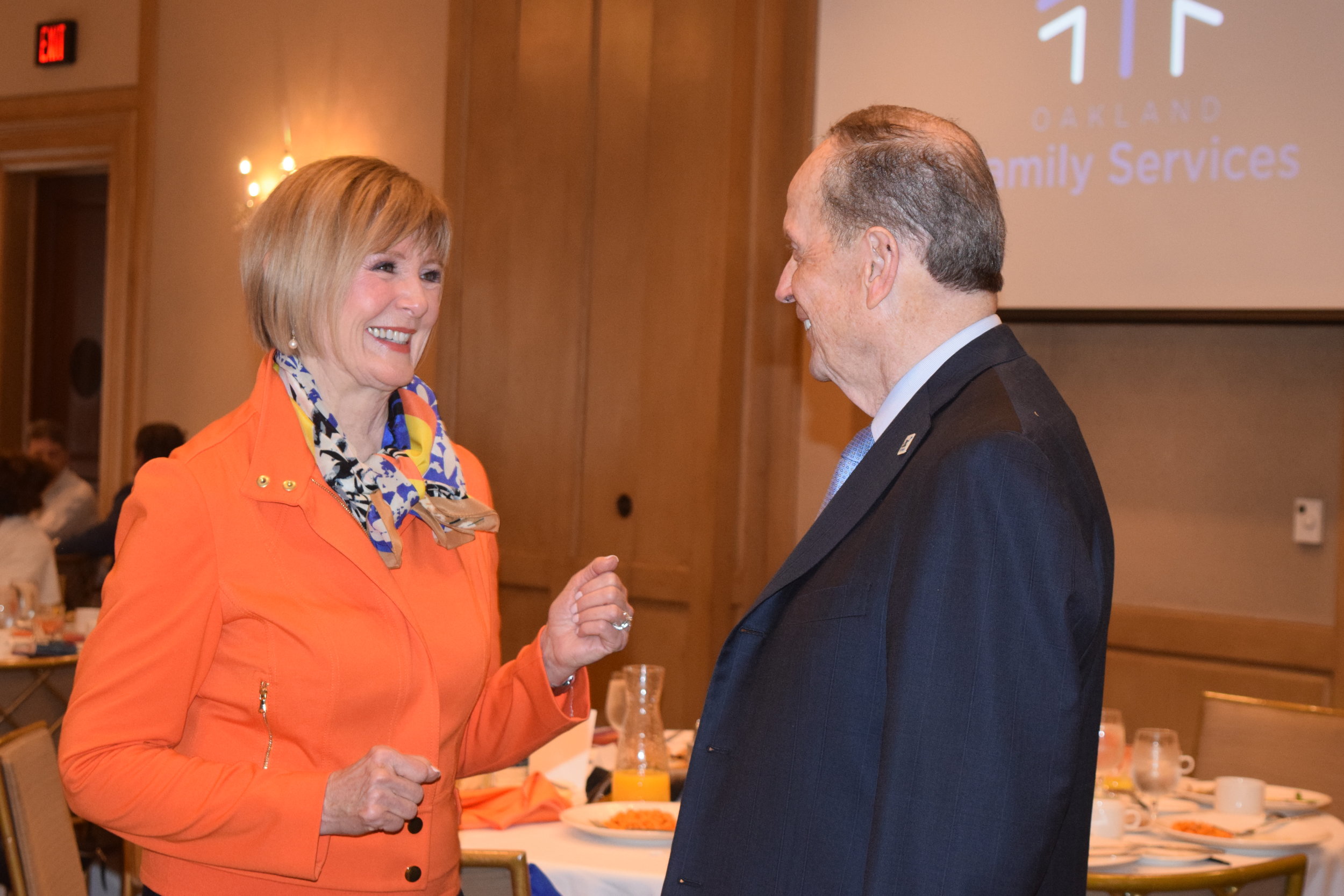 Board members Lassie Lewis and Ken Whipple chat during the breakfast.