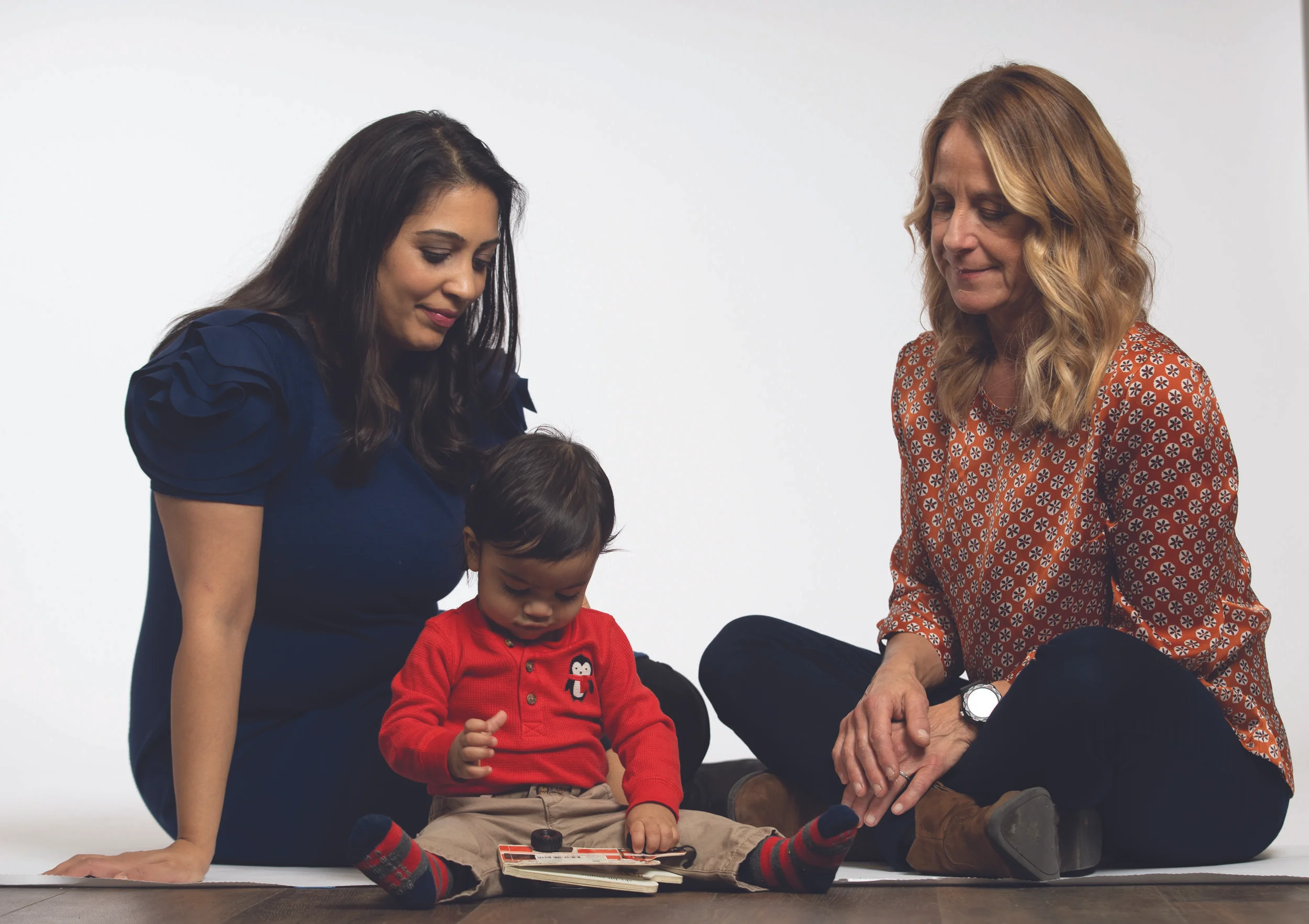 Reshma and her son, Nikhil, with Early Learning Communities Instructor Julie Lemay.