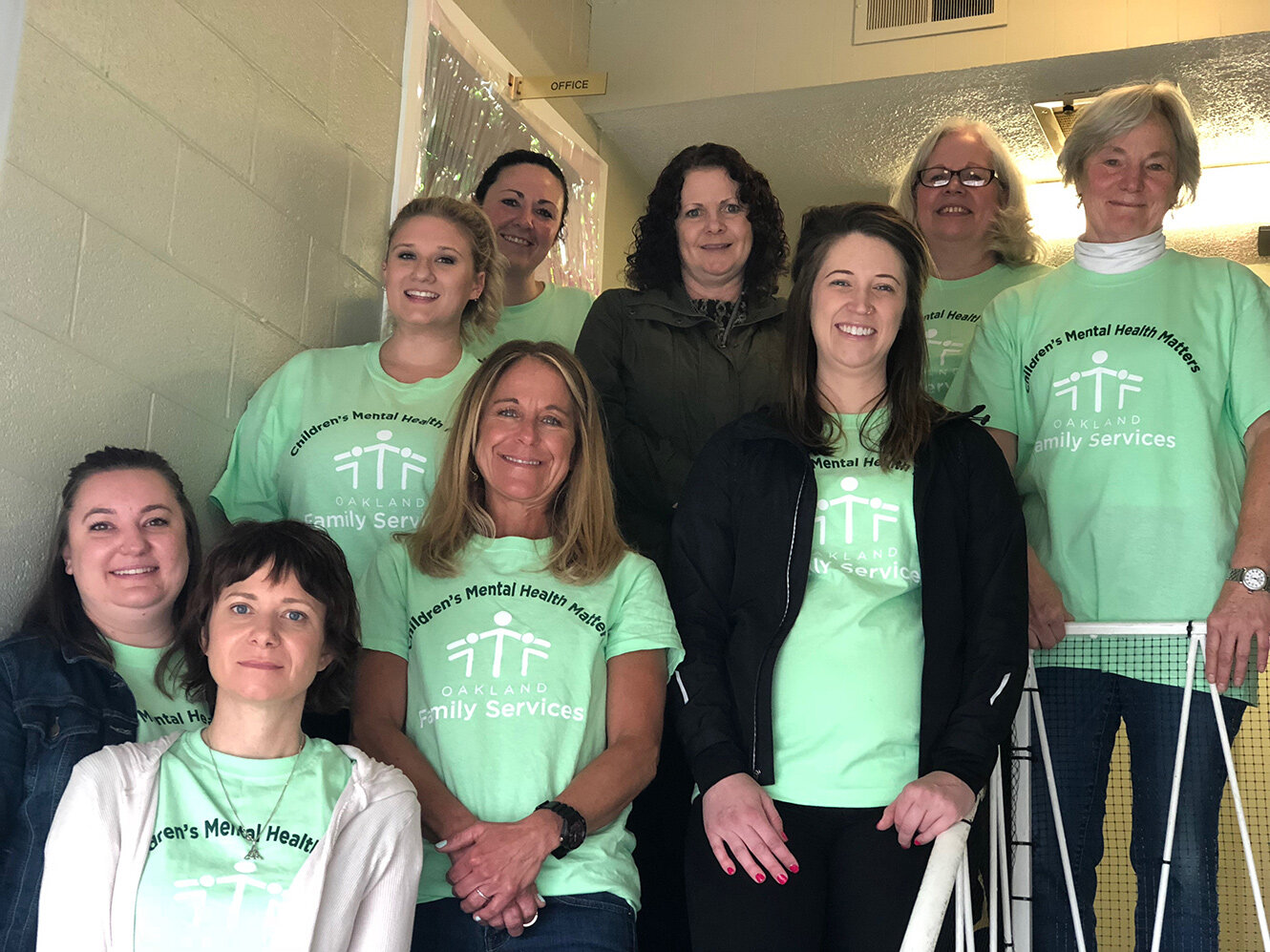  Staff celebrate Children’s Mental Health Awareness Day in 2019 at Oakland Family Services’ Berkley office. 