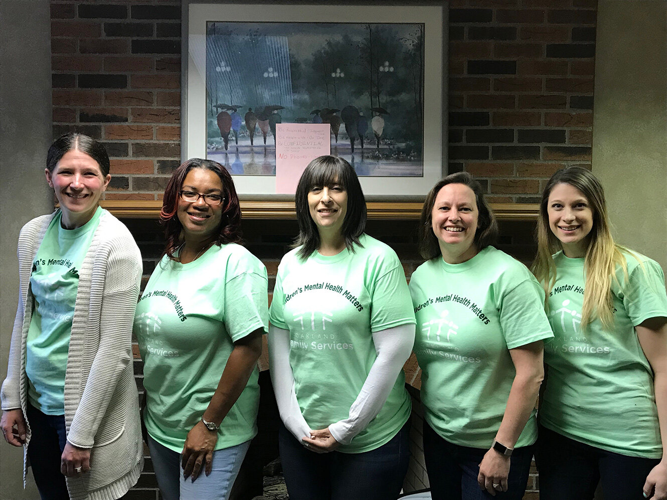  Staff celebrate Children’s Mental Health Awareness Day in 2019 at Oakland Family Services’ former Rochester office. 