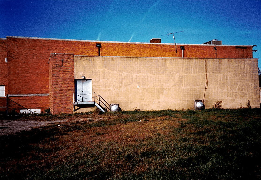  This photo of the back of the building was taken before Oakland Family Services purchased the property. Today, this space is home to the Children’s Learning Center’s natural playground. 