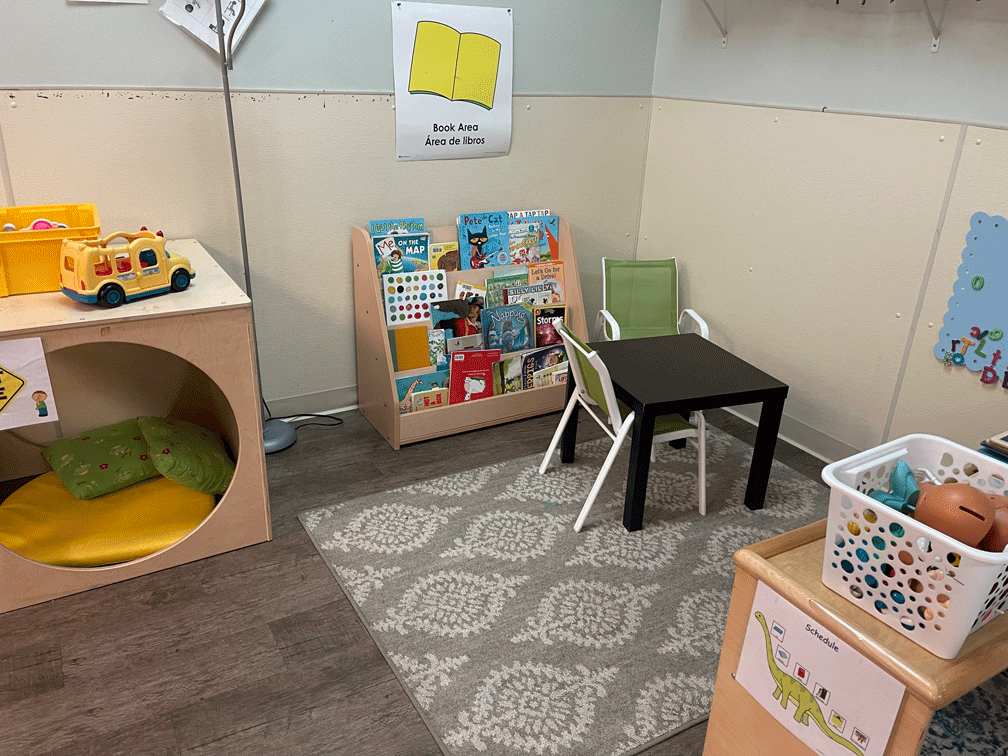  Each of our classrooms features cozy spaces where children can curl up with a good book. 