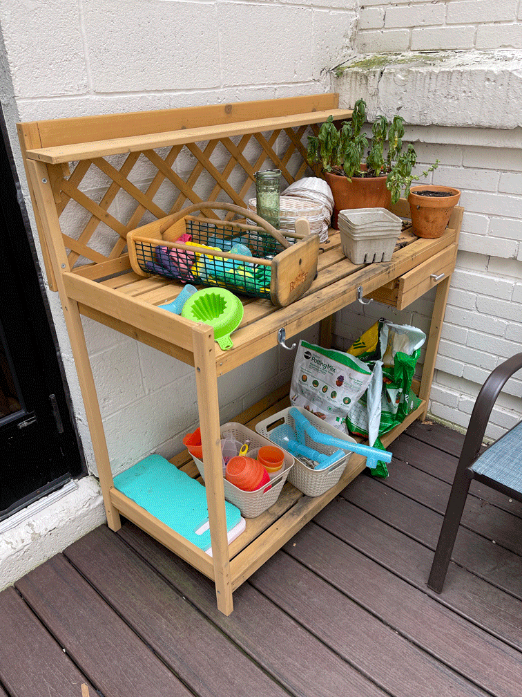  Students can practice their gardening skills at a potting bench that is just their size. 