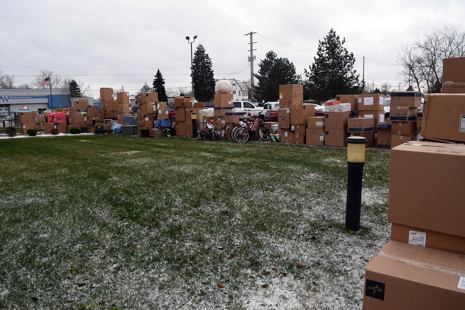  Adopt A Family gifts are lined up outside of Oakland Family Services’ Pontiac office in 2019, the last year the agency was able to collect physical gifts. This year marks an exciting return to Adopt A Family tradition! 