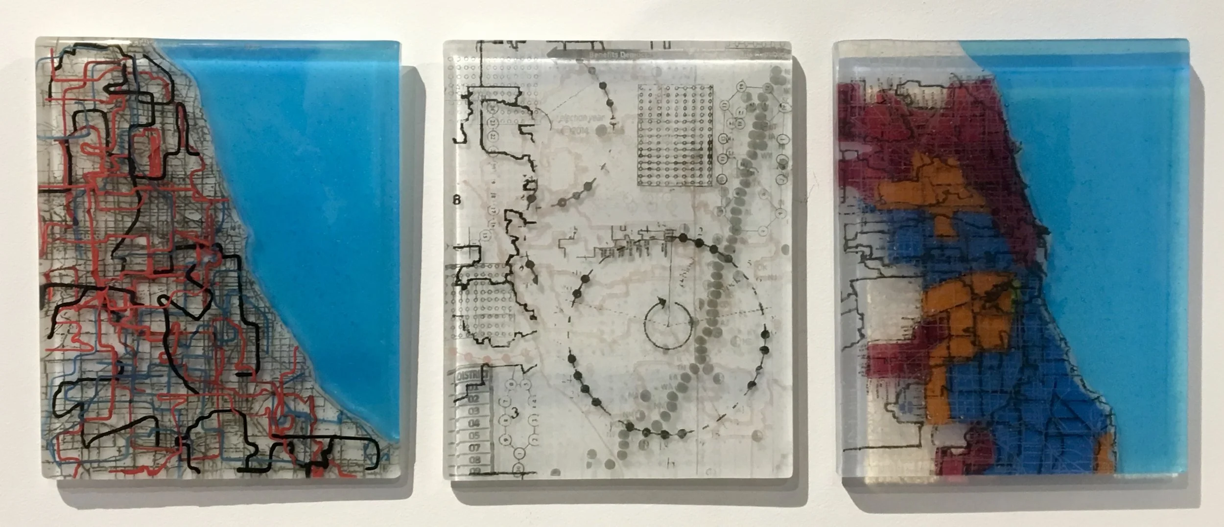  Districts, Demographics and Algorithms   (Gerrymandering, Mapping and Census information)  Kilnformed glass, screenprinted enamel, red, black, blue stringers  Each panel 8” x 10” x 1/2”  2018 