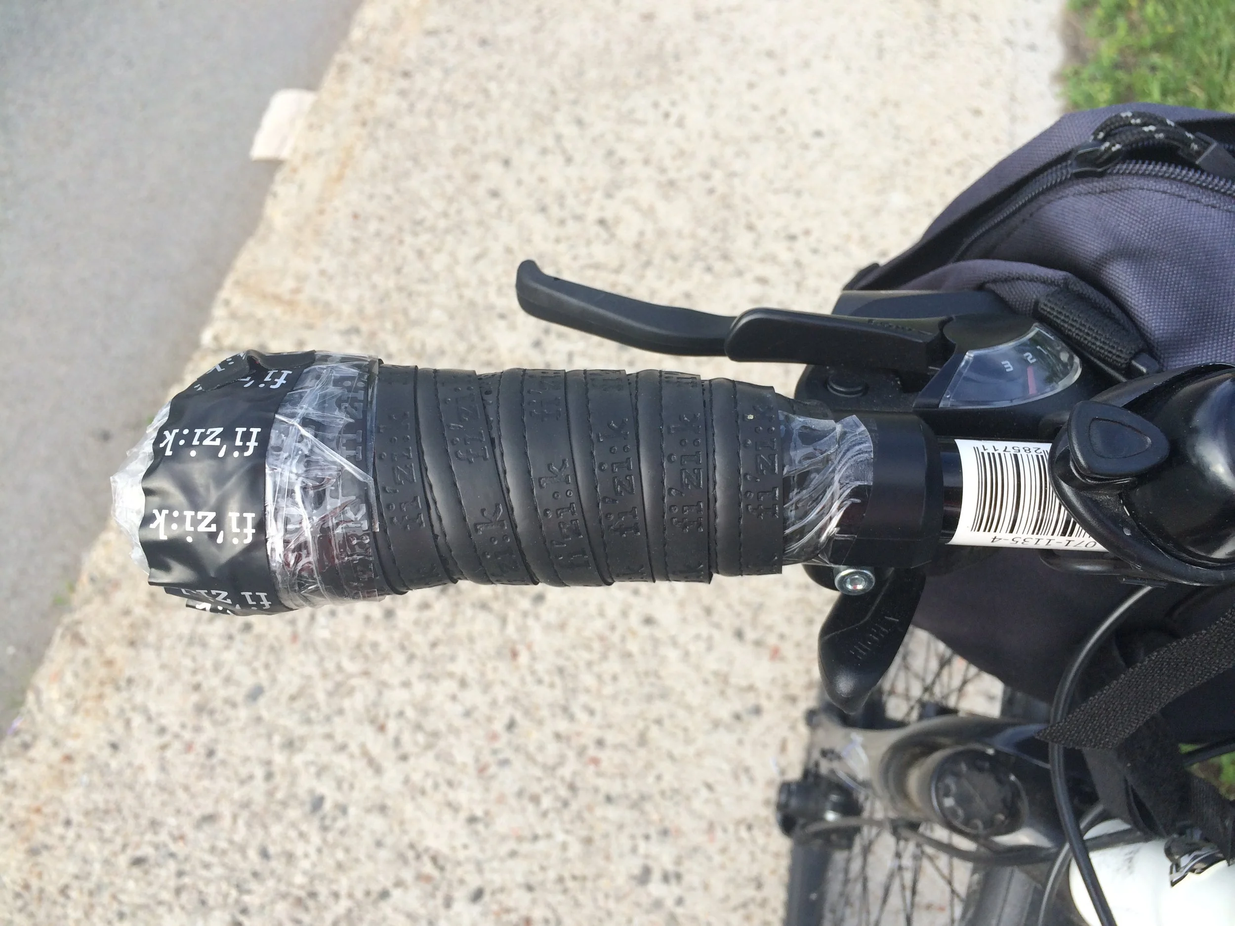 Improvised a solution to my hand pain to absorb some of the vibration of the bike - definitely not a complete solution though.
