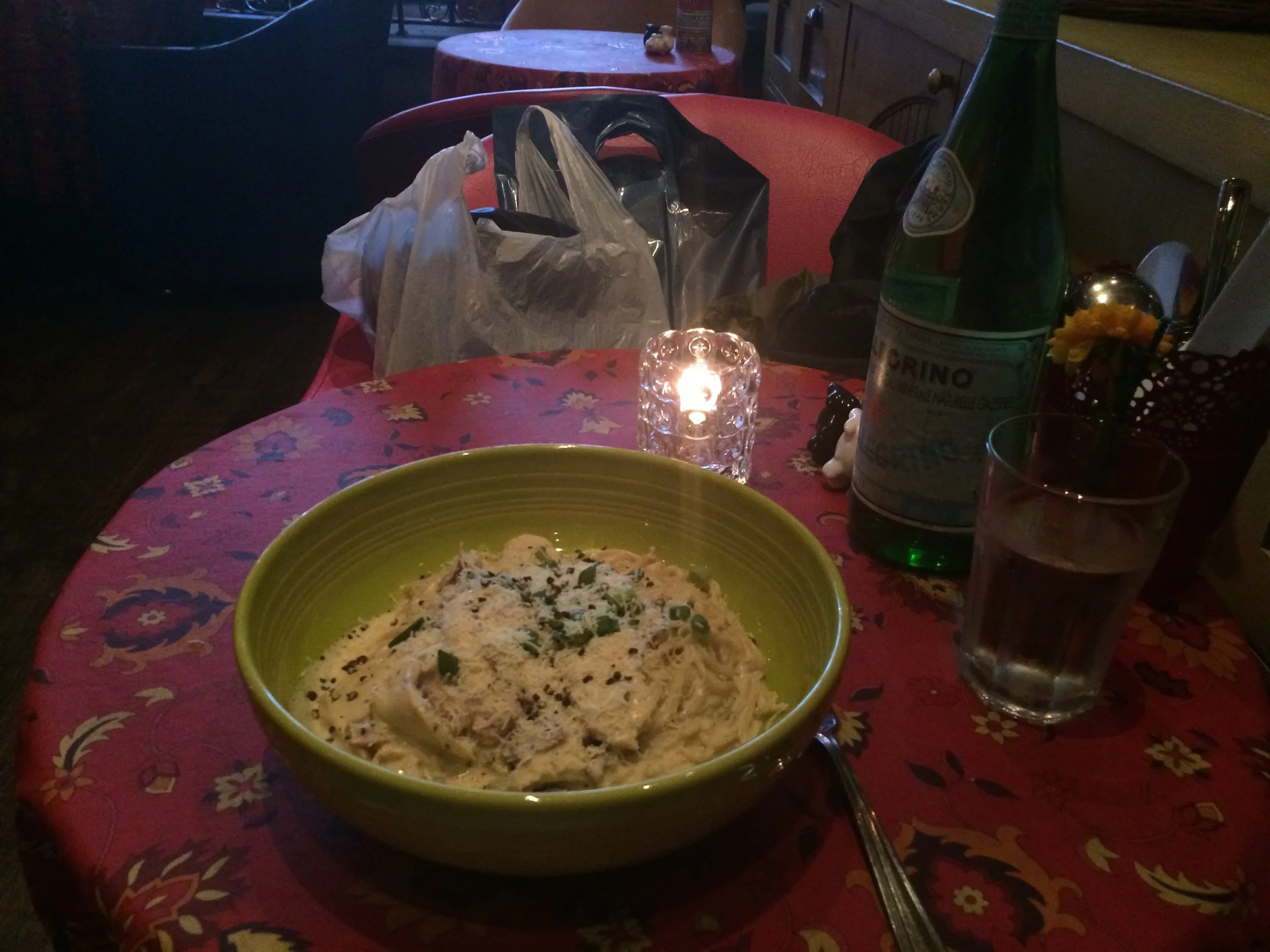 Romantic candlelit dinner at an Italian restaurant with my laptop bag - I really treasure these moments. 