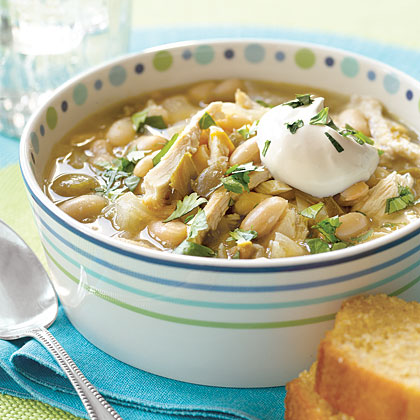 2 cans great northern beans 2 16-oz cans chicken broth 2 lbs cooked chicken, cut into 1-inch cubes 1 14-oz jar medium salsa 1 can cream of chicken soup 4oz shredded Cheddar or Colby jack cheese Serves 6. Simmer beans, broth and chicken for 5 minutes. Add soup and stir well. Add salsa and simmer for 1 hour, stirring occasionally. Add cheese before serving.