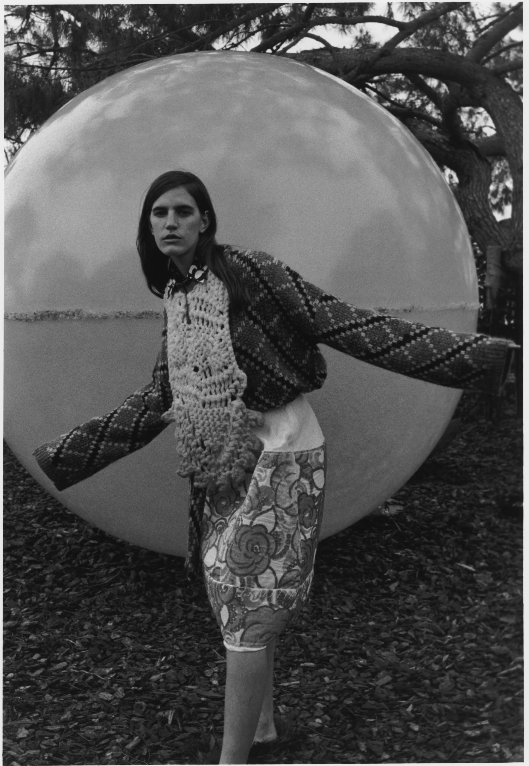 Sweater by Loewe. Shirt by Katharine Hamnett. Bib by Congregation. Skirt by Marni. ‘The Sphere 3D Spectrum’, by Clifton Mahangoe. Photography: Jack Symes. Fashion: Marianthi Hatzikidi
