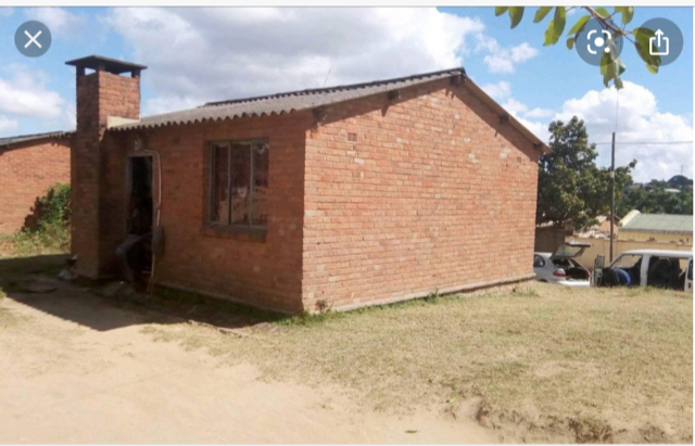 malawi village house - Google Search.png