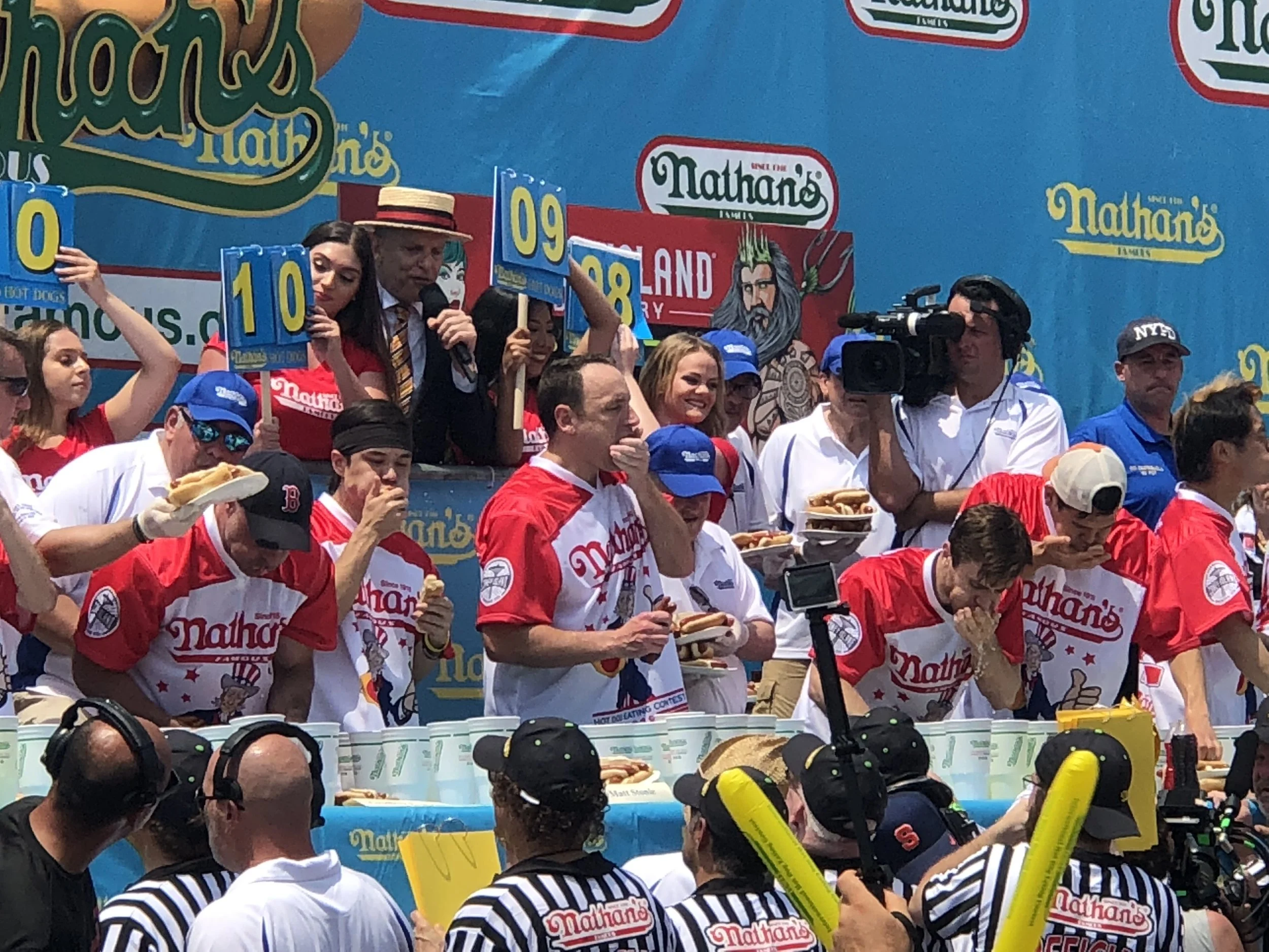 Defending champ Joey Chestnut sets record with 74 hot dogs
