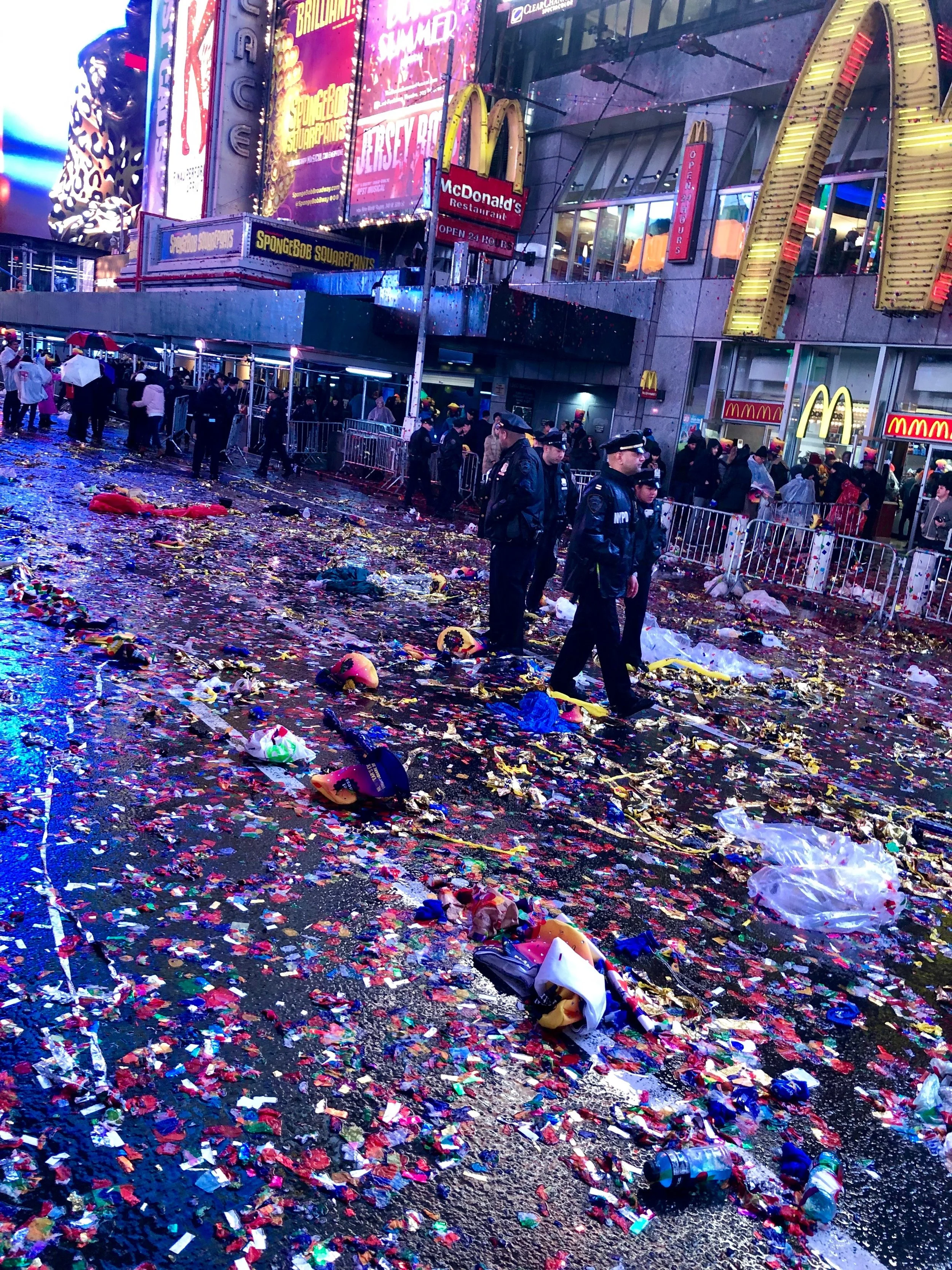 Times Square crowd braves rain to bid wet welcome to 2019