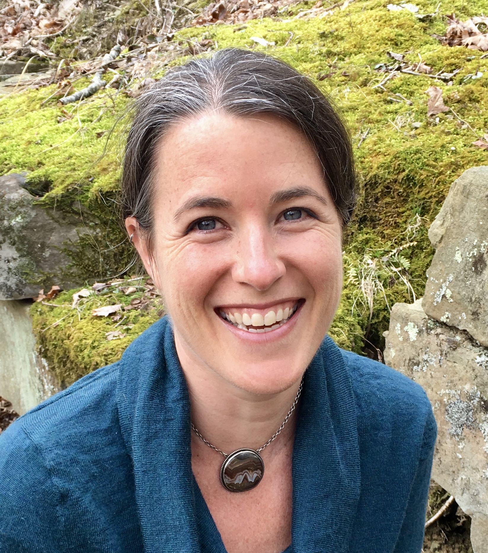 Carrie Brunk on the land at Clear Creek. (photo by Robert Martin)