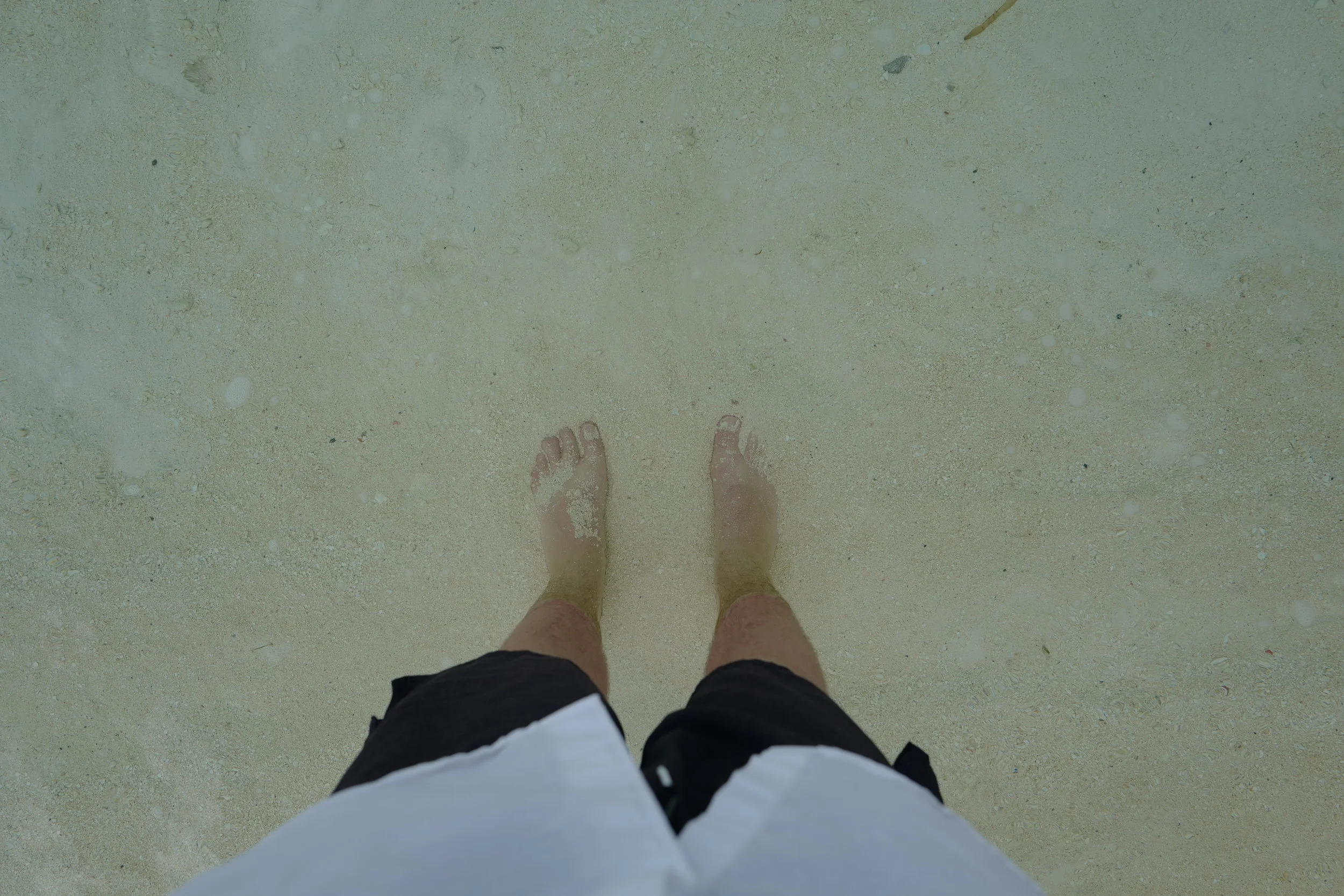  You can't even tell Hunter's feet are in the water! The beach in front of that insanely expensive villa has waters that are crystal clear and completely still. The wind is blocked on this side, which helps with the clarity of the water. 