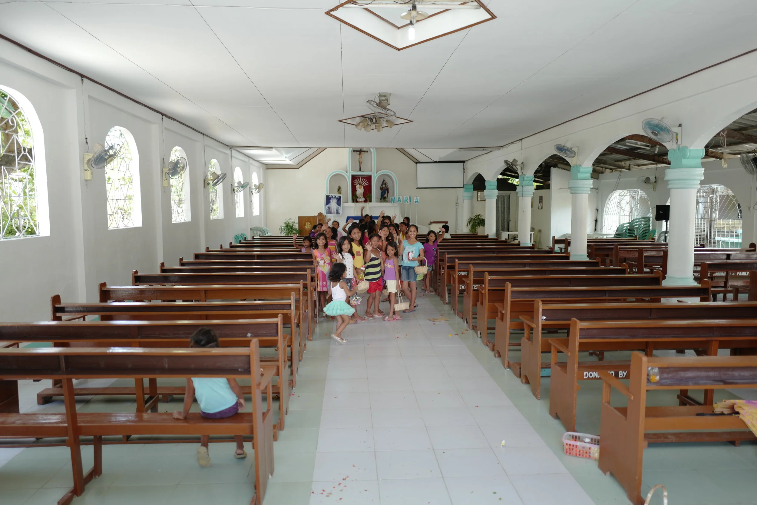  Some kids singing at the church since it was a Sunday! They were so excited to see us, and were all waving hi!! 