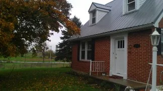 Our 1944 Cape Cod on the day we bought it.