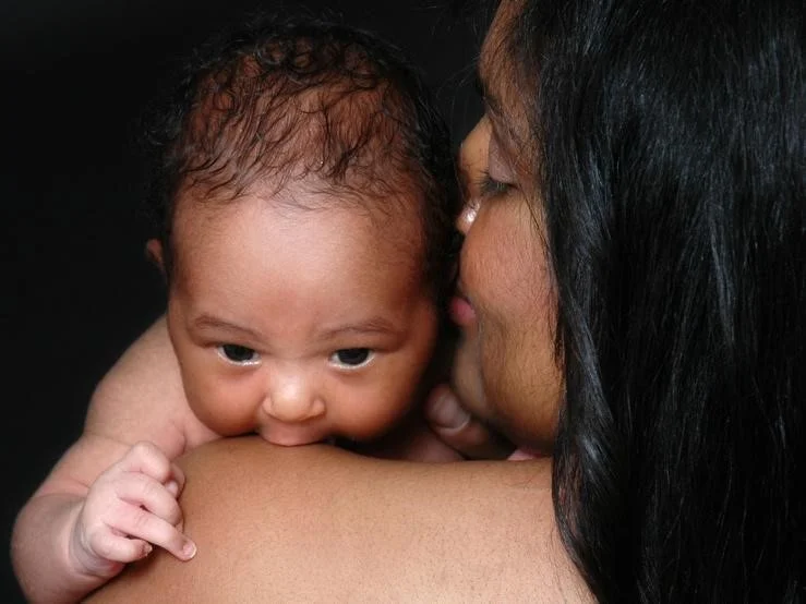 mother-making-baby-burp.jpg