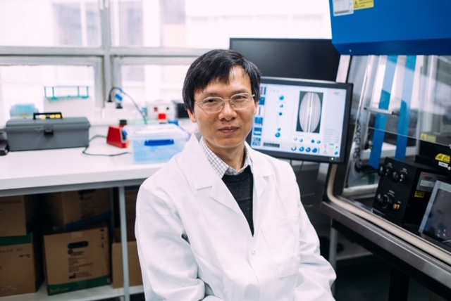 Dong Xu Liu close up in lab.jpg