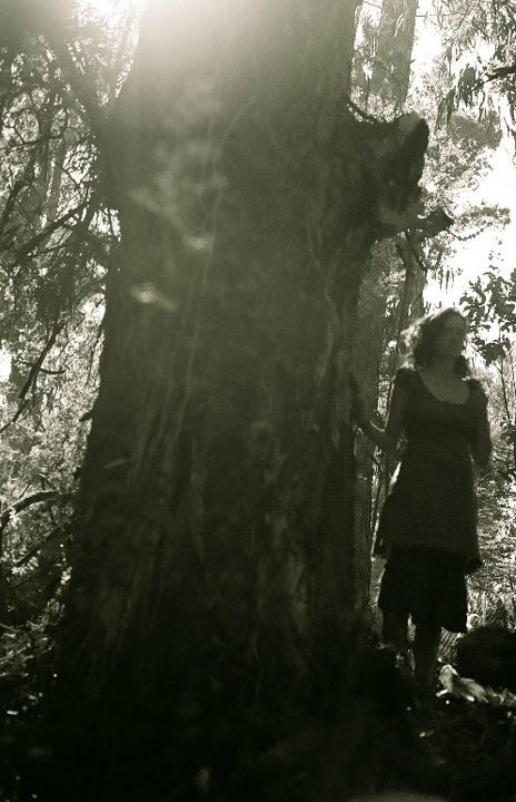  Woman standing in the trees, Golden Gate Park 