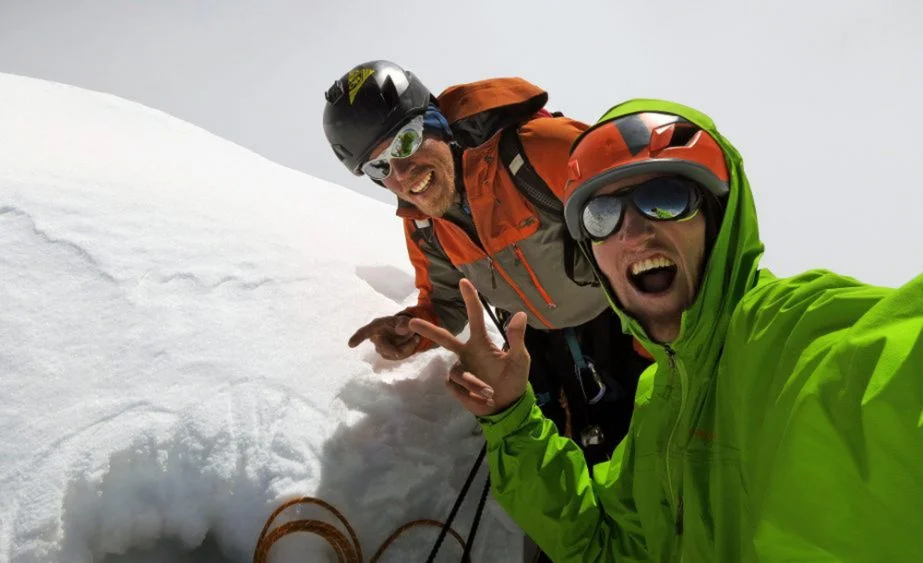 Hayden Kennedy (front) and Kyle Dempster summit shot after making the first ascent of the South Face on Ogre I. The ascent won the team a Piolet d'Or (Source: RockandIce )