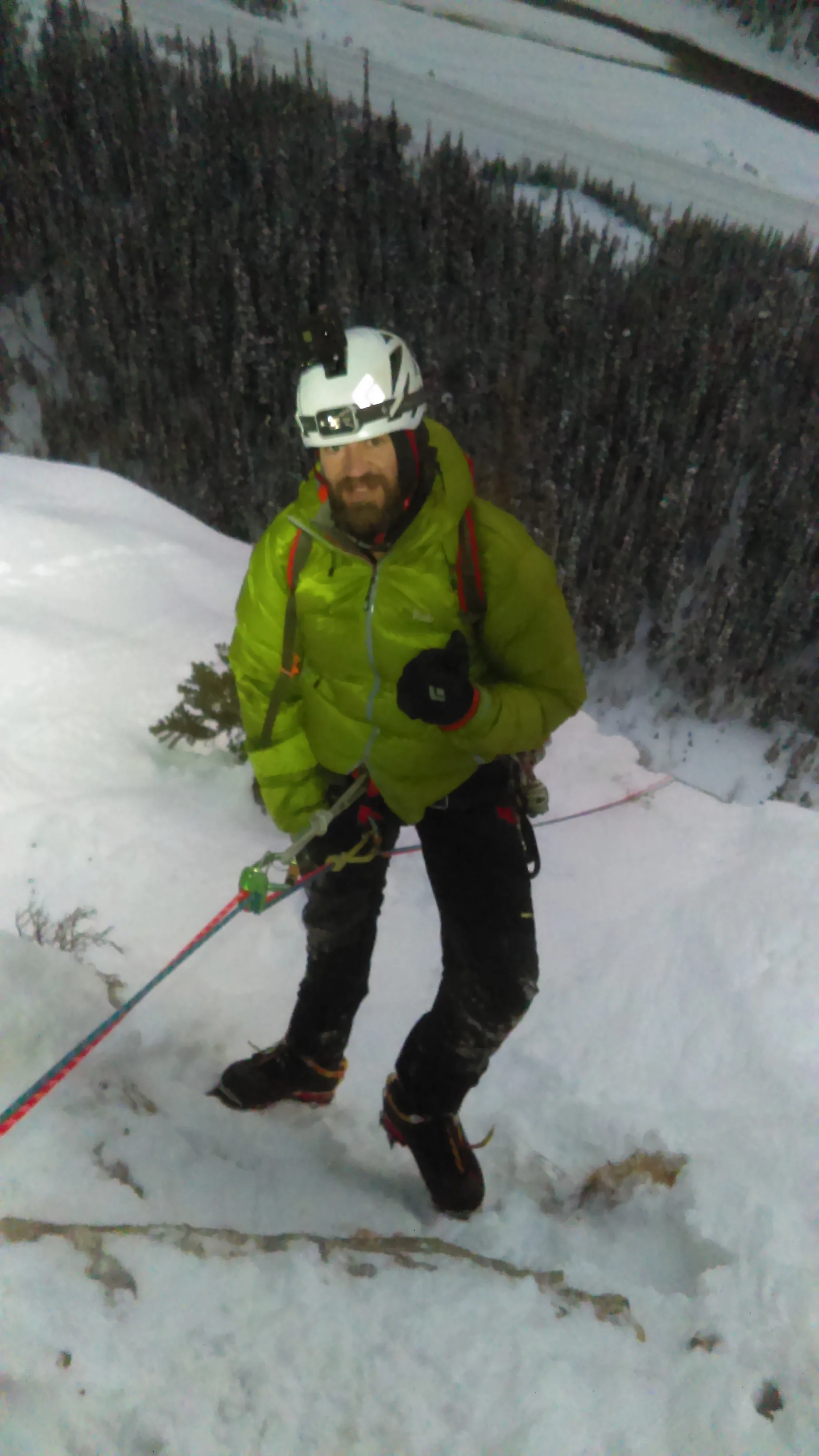 James heading off on the first rappel at the top of the route.