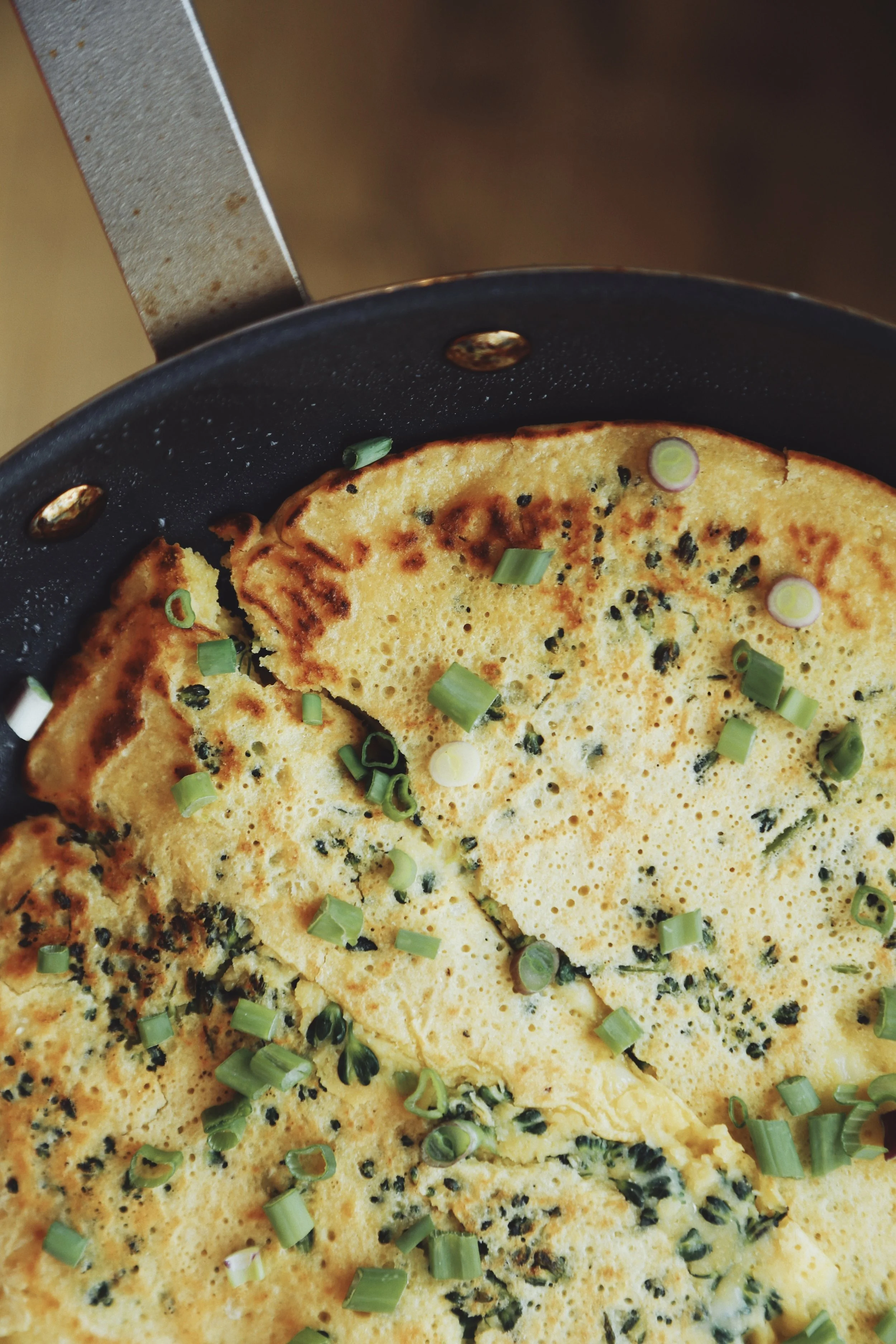 The best chickpea flour frittata with broccoli rabe and creamy plant-based cheese