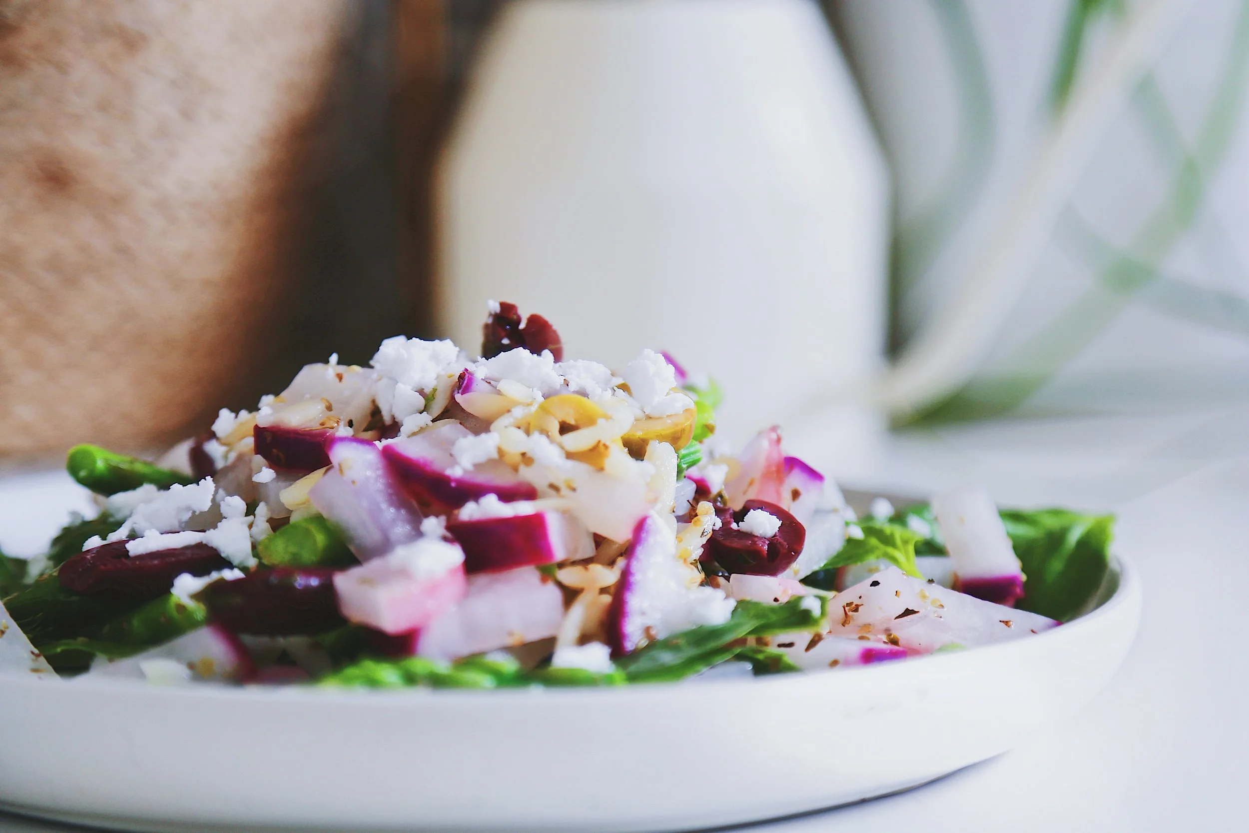 Spring-inspired pasta-ish salad with radish, asparagus, homemade nut cheese and an oil-free vinaigrette 