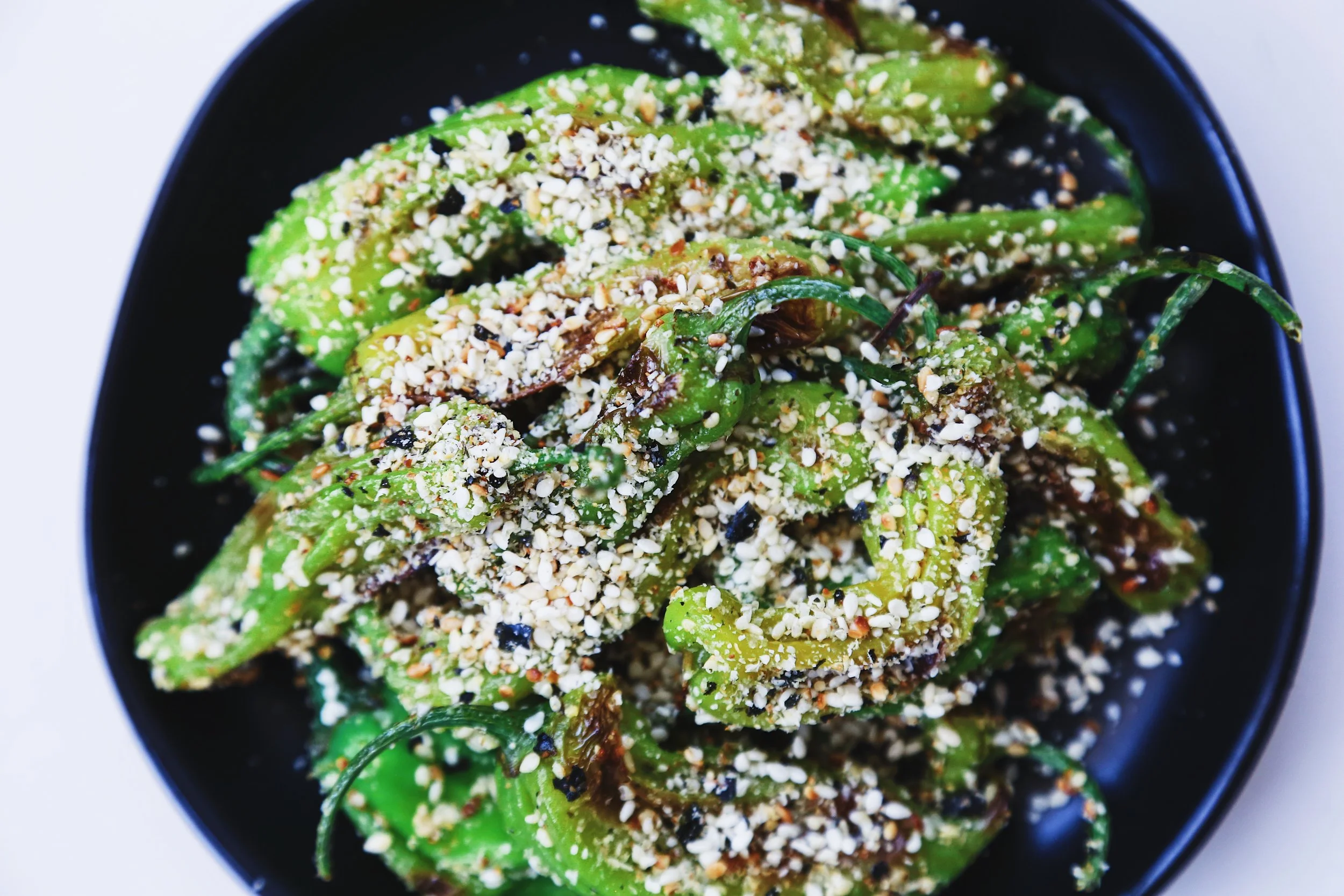 The best blistered lemony shishito peppers with gomasio