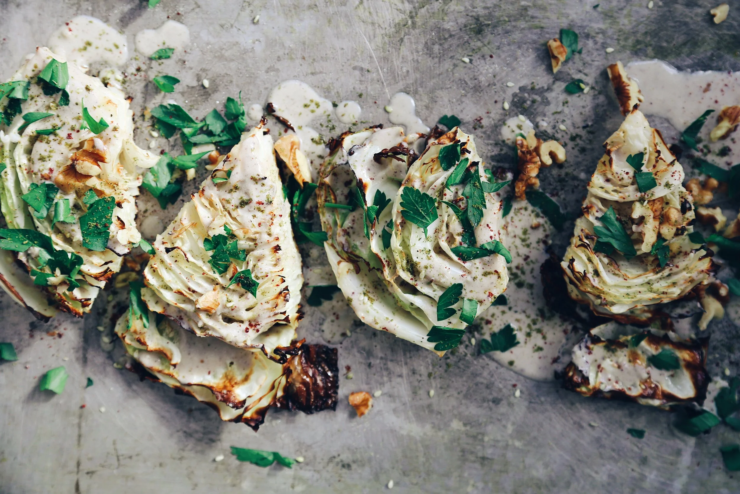 Roasted cabbage with a sumac and za'atar spiced lemon and tahini saucy dressing