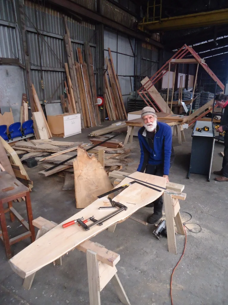 Brian works on a memorial seat. (Copy)