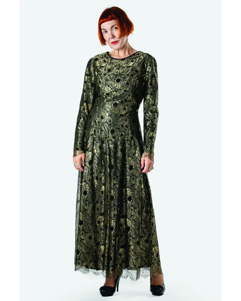 Caroline Charles Vintage 80s  evening gown in gold lace with black lining.