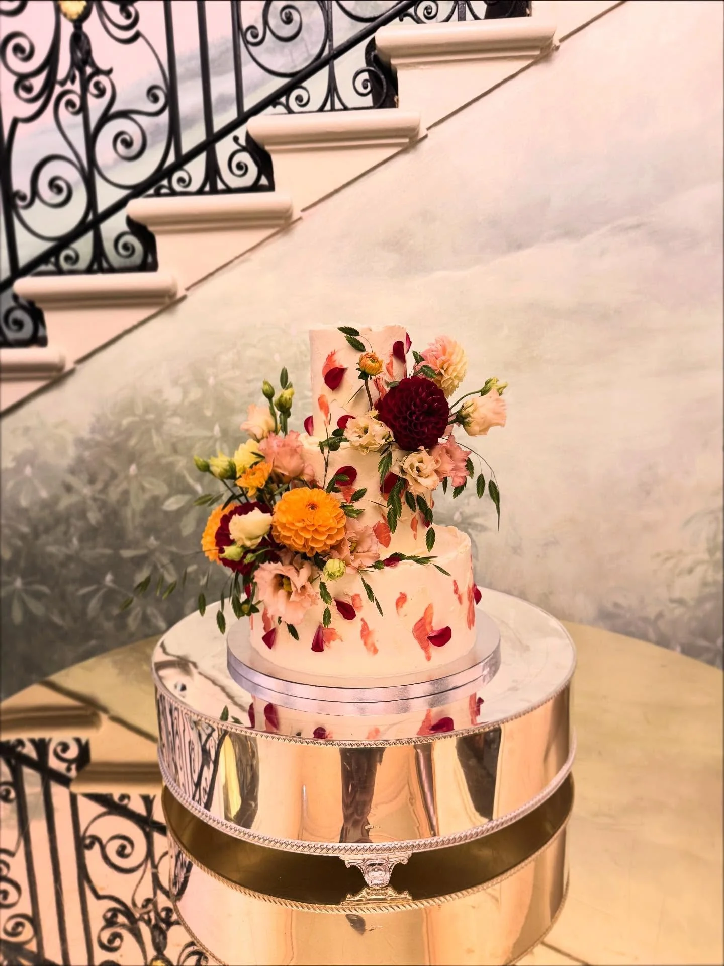 Congratulations Basanti &amp; Slavyan 🥂 Another dreamy wedding at the beautiful @hedsor 🌸

A tiramisu inspired cake on the inside, contrasted with these beautifully bold coloured florals on the outside by @lavendergreenflowers 💛🌸