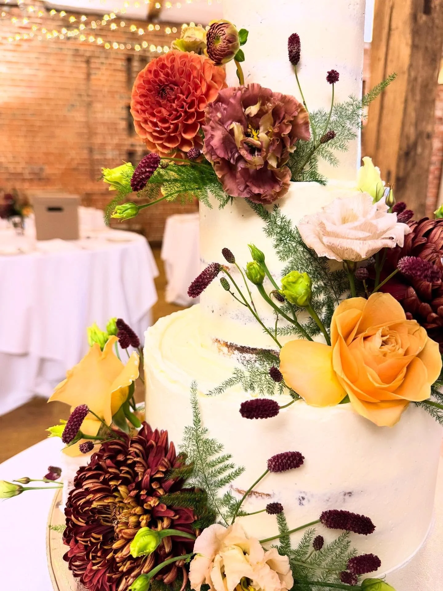 Congratulations Andrew &amp; Jonathan 🍊🌸🤎

Another beautiful wedding at @wasingweddings .. three tiers of marble cake, each with their own filling; raspberry jam, orange curd and salted caramel. Finished with stunning blooms by @thewildgardenflori