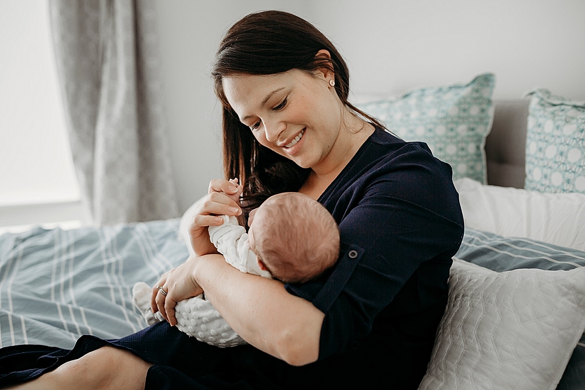 Mother and baby at newborn photography session