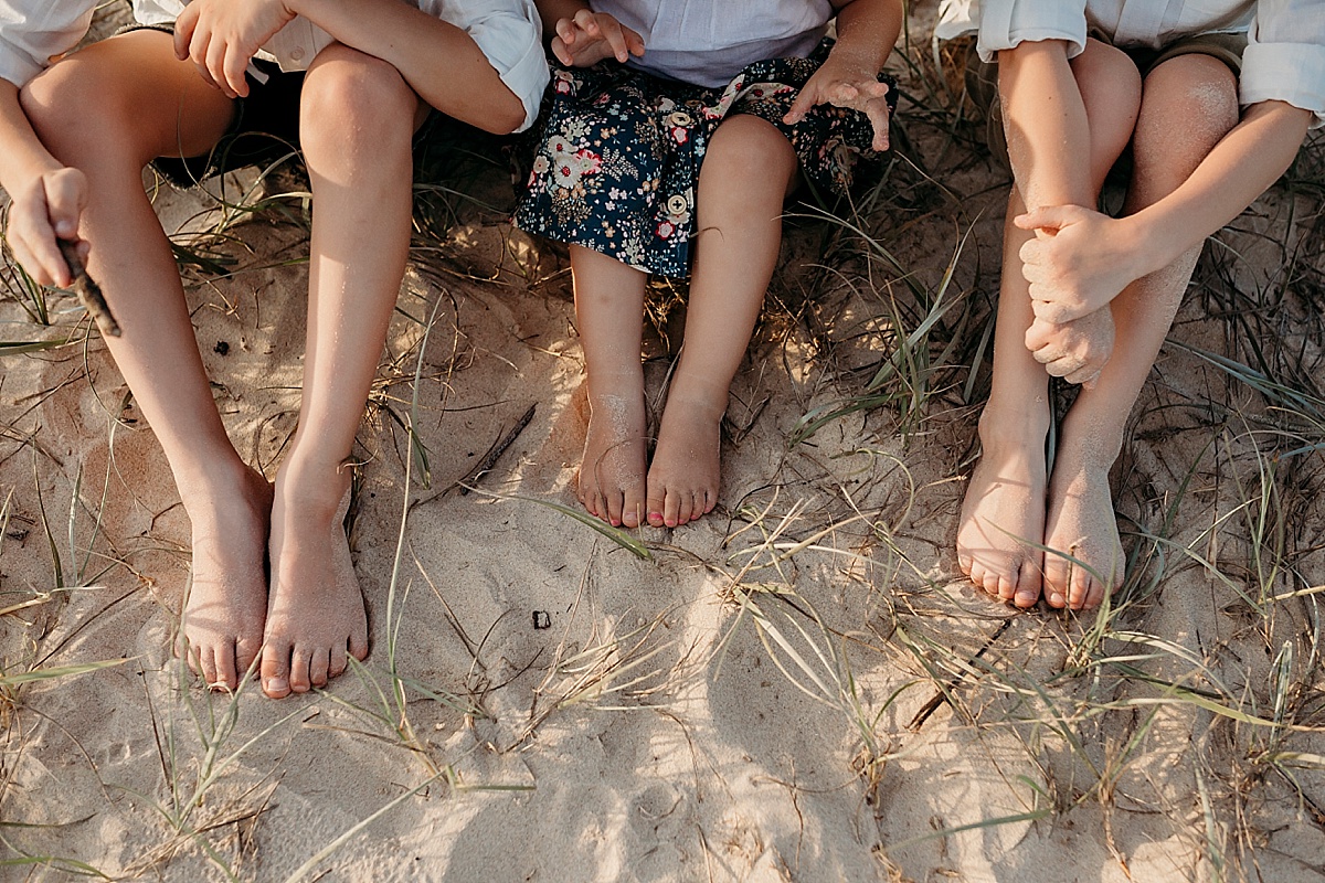 Three pairs of children's feet