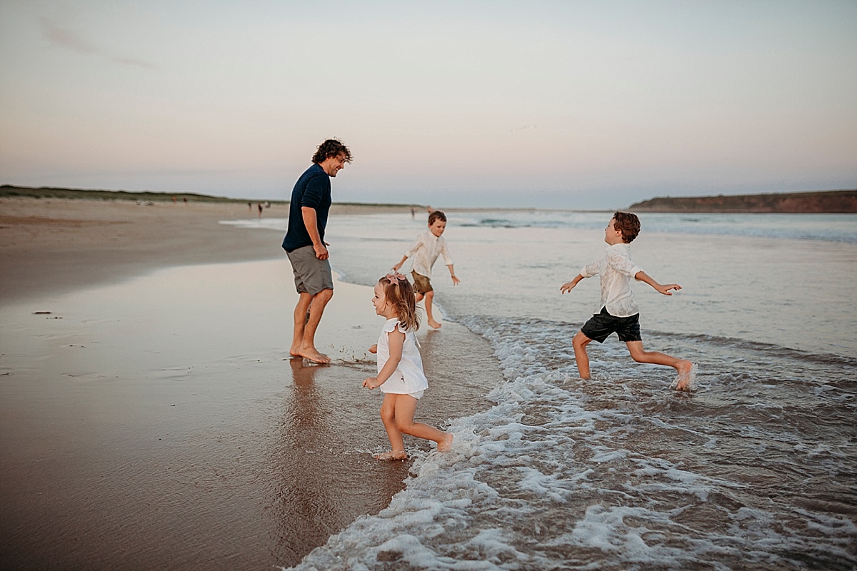 kicking water around at beach