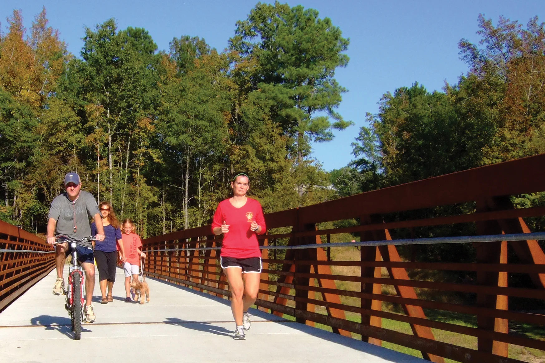 Biker-&-jogger-on-bridge.jpg