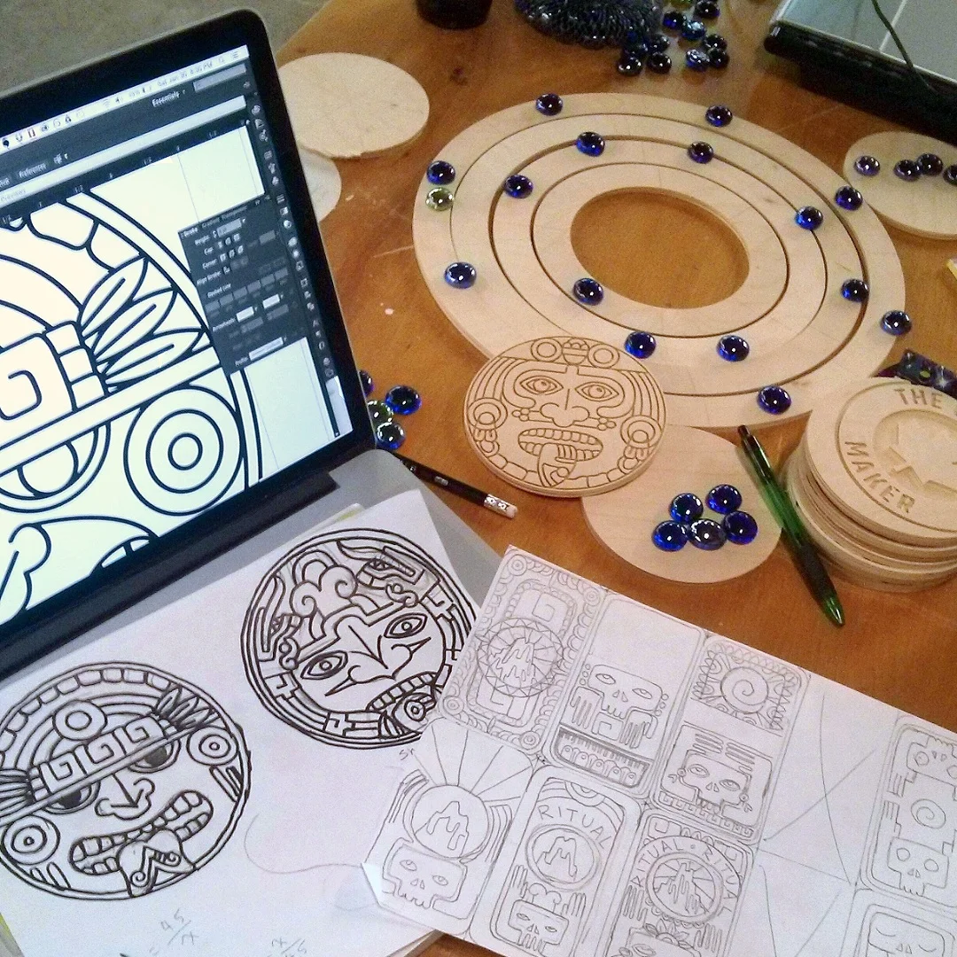 Fig. 4 I developed the designs of the ‘God Piece’ and backs of playing cards from sketches, then traced them in Adobe Illustrator. The vector drawing of the ‘God Piece’ was then fed to the CNC Router Program to create the final wooden version.
