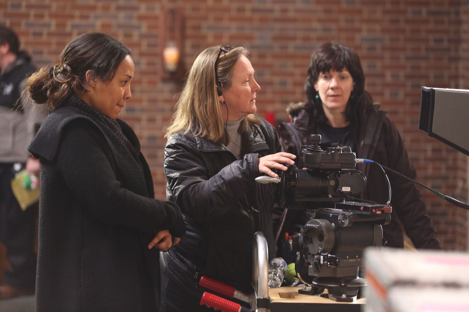 Maggie Betts, left, directs crew in Novitiate