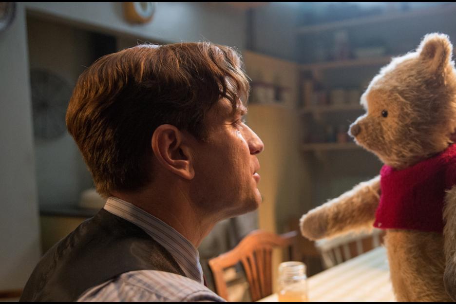 An uptight, adult Christopher Robin (Ewan McGregor) gets reacquainted with Pooh.