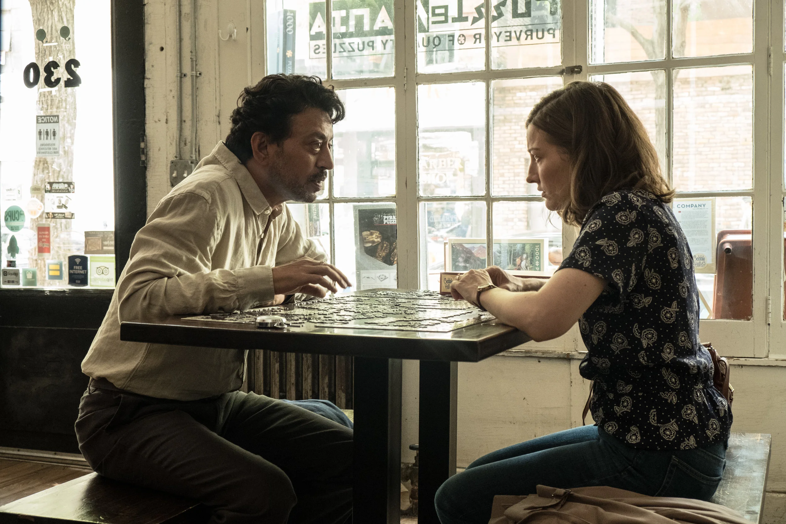 Irrfan Khan and housewife Kelly MacDonald try to figure out her gift for puzzle-solving in Puzzle