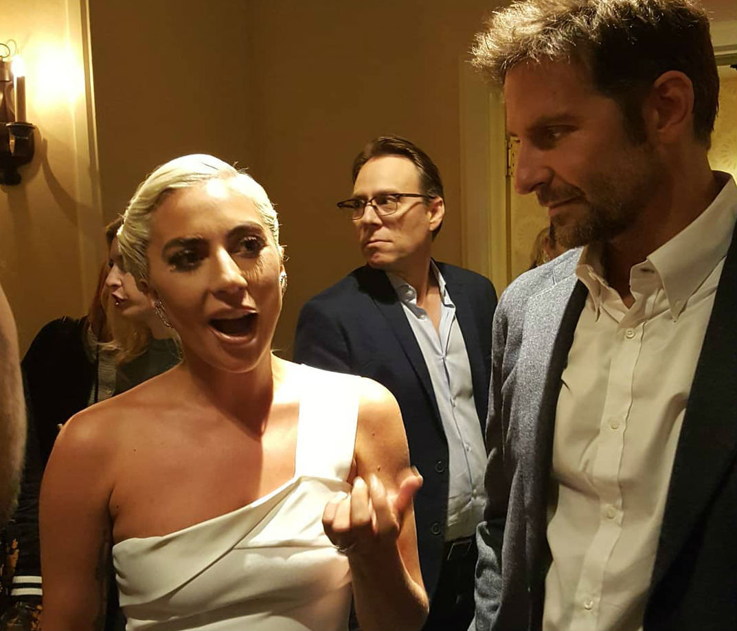 Lady Gaga and Bradley Cooper make an entrance.