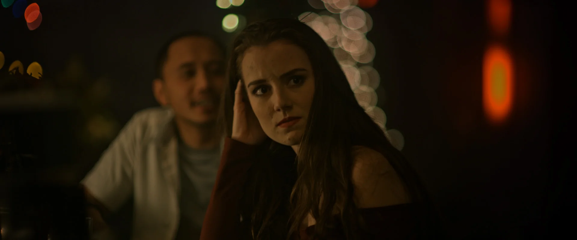 Julia (Lora Burke) waits at the bar for the next shape-shifter to sweep her off her feet in Lifechanger