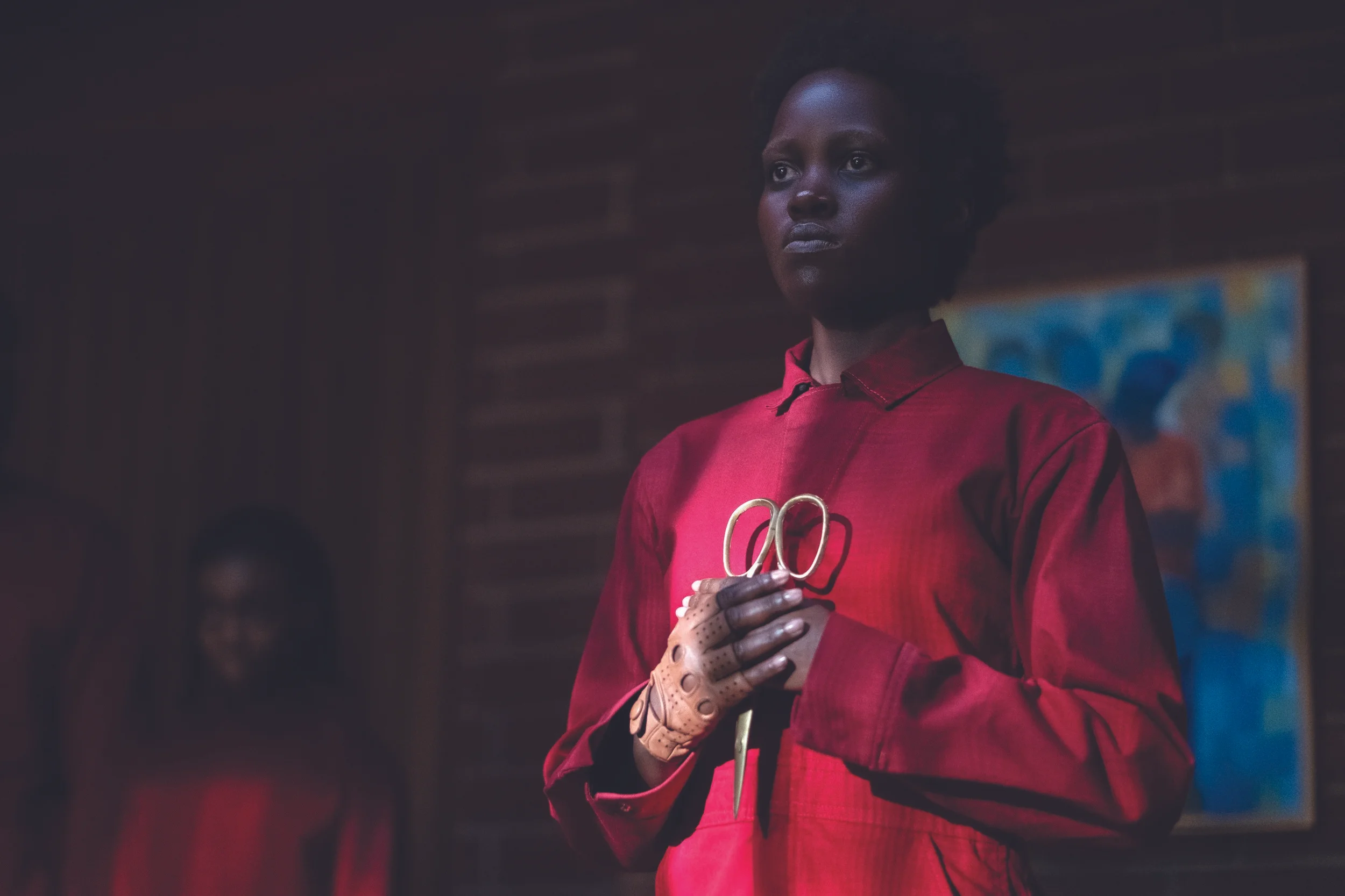 Lupita Nyong’o playing her bad self in Jordan Peele’s Us.