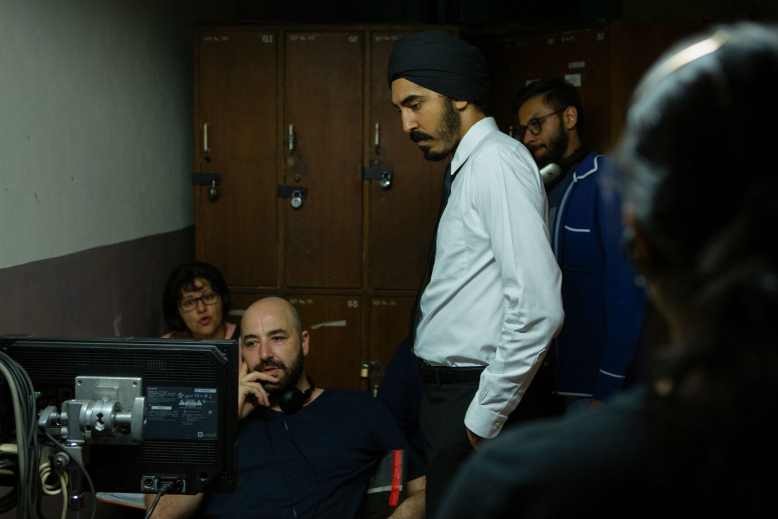 Director Anthony Maras (left) and actor Dev Patel (right) on the set of Hotel Mumbai.